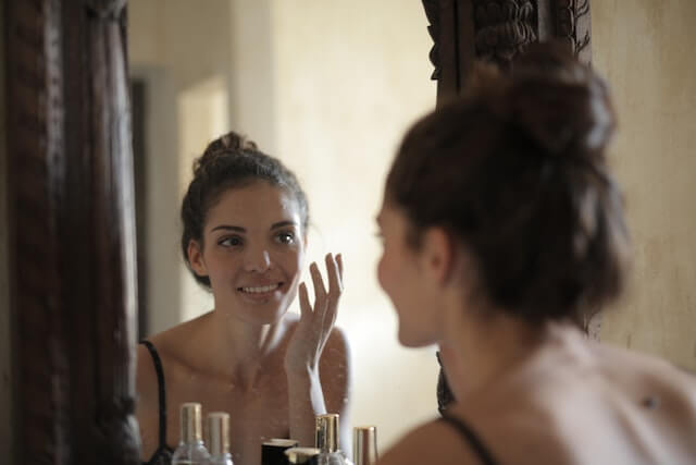 Woman preparing beauty routine - fermented skincare concept